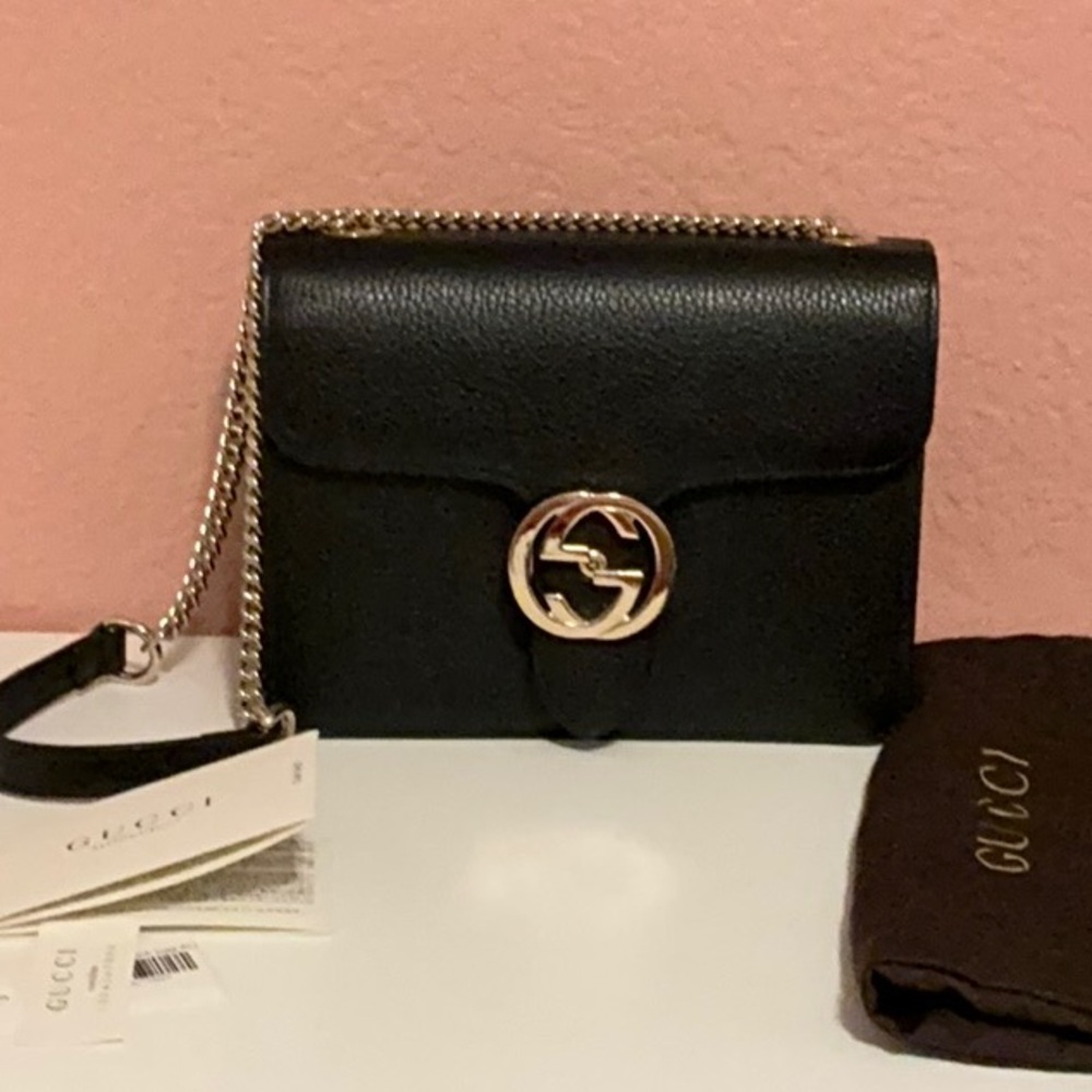 Gucci Black Crossbody Bag with Gold Emblem